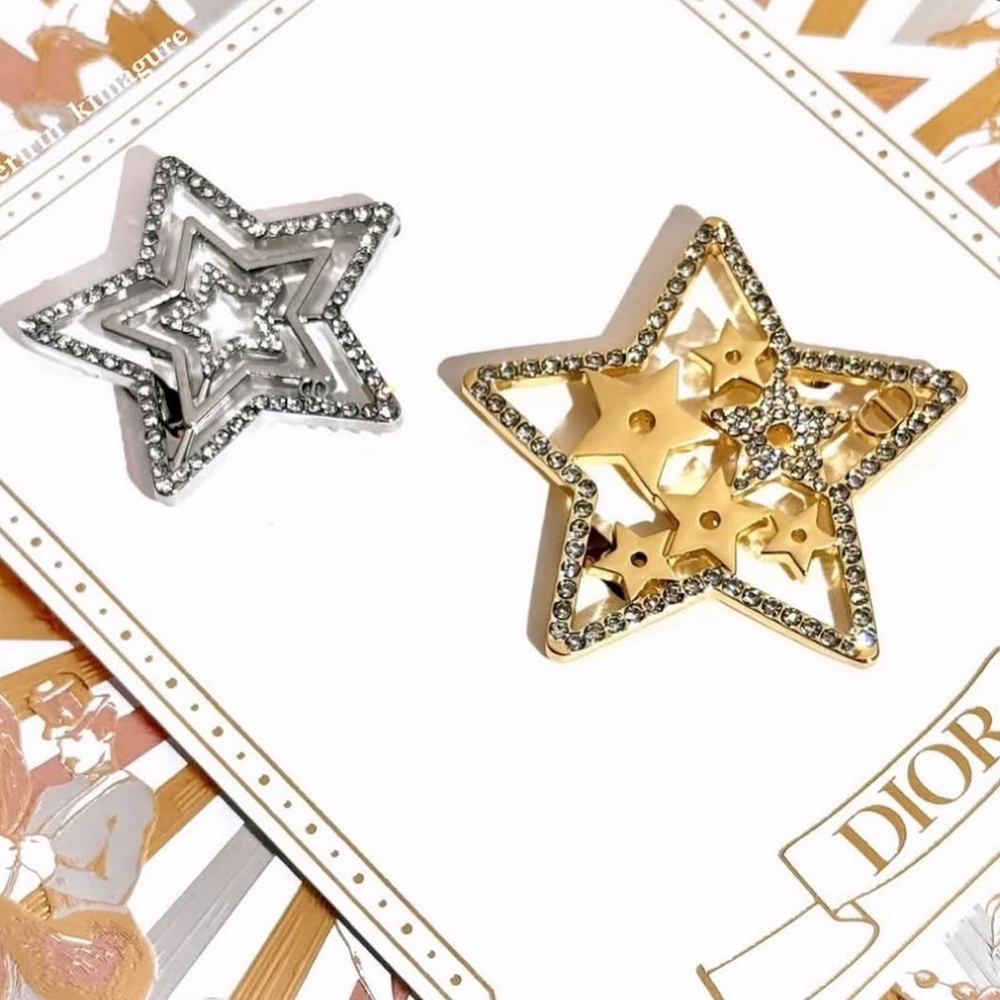 New and authentic Dior Silver and Gold Star Hair Clips
Limited edition. - Picture 8 of 9